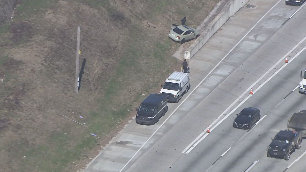 Man goes airborne in car, lands down embankment next to I