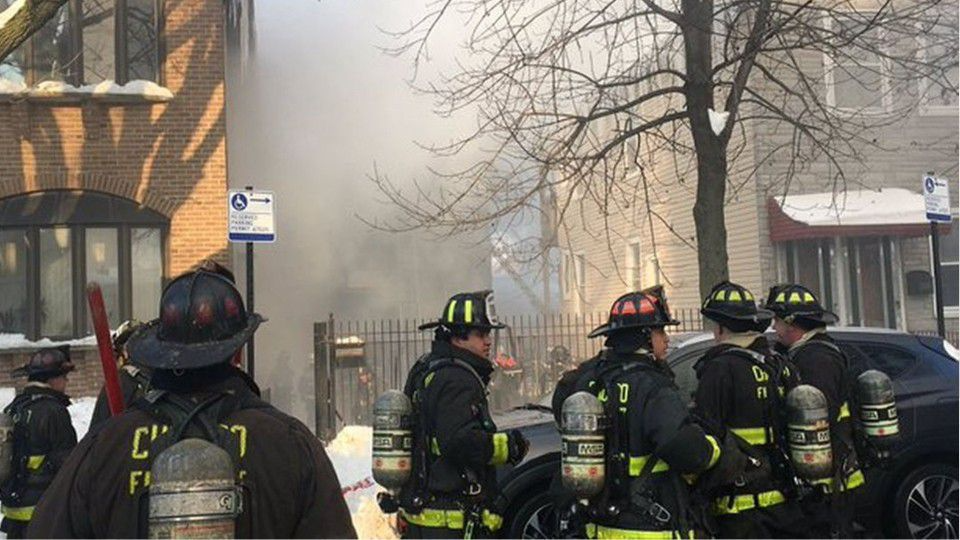 Chicago firefighter jumps roof to roof for safety while battling
