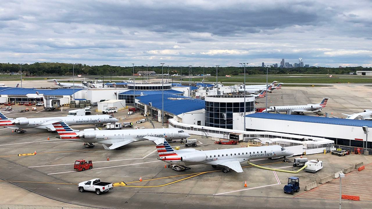 Baggage handler, gate agent at Charlotte Douglas test positive for