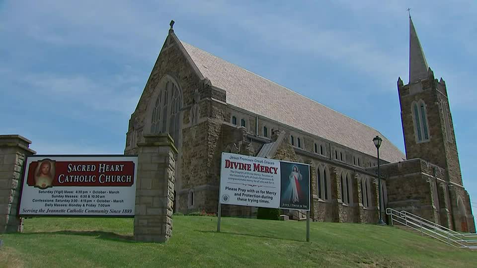 church, heavily damaged by water, congregants back