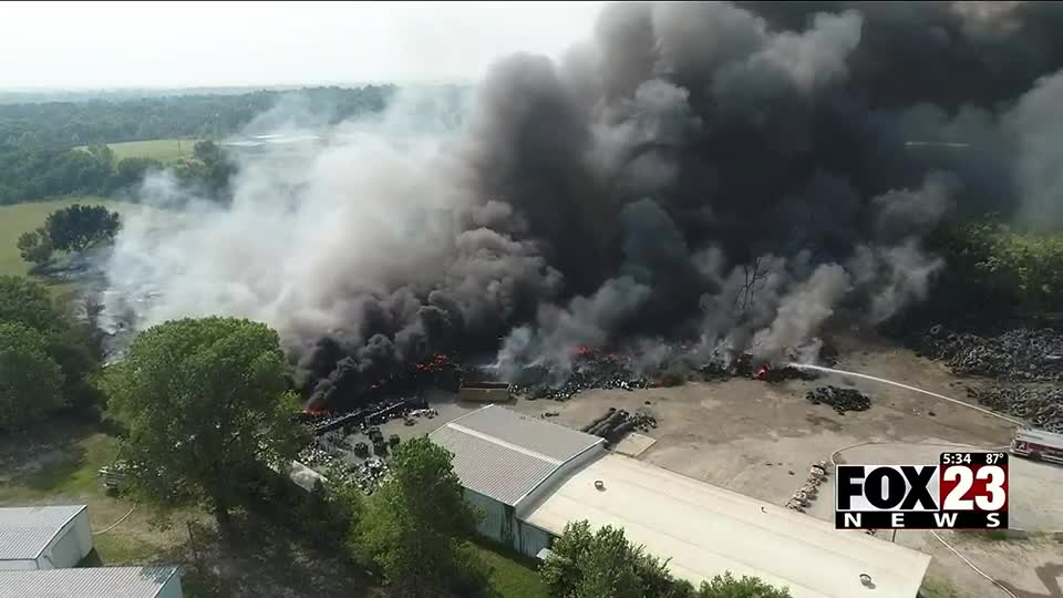 Bristow tire plant fire continues to smolder, DEQ cites violations