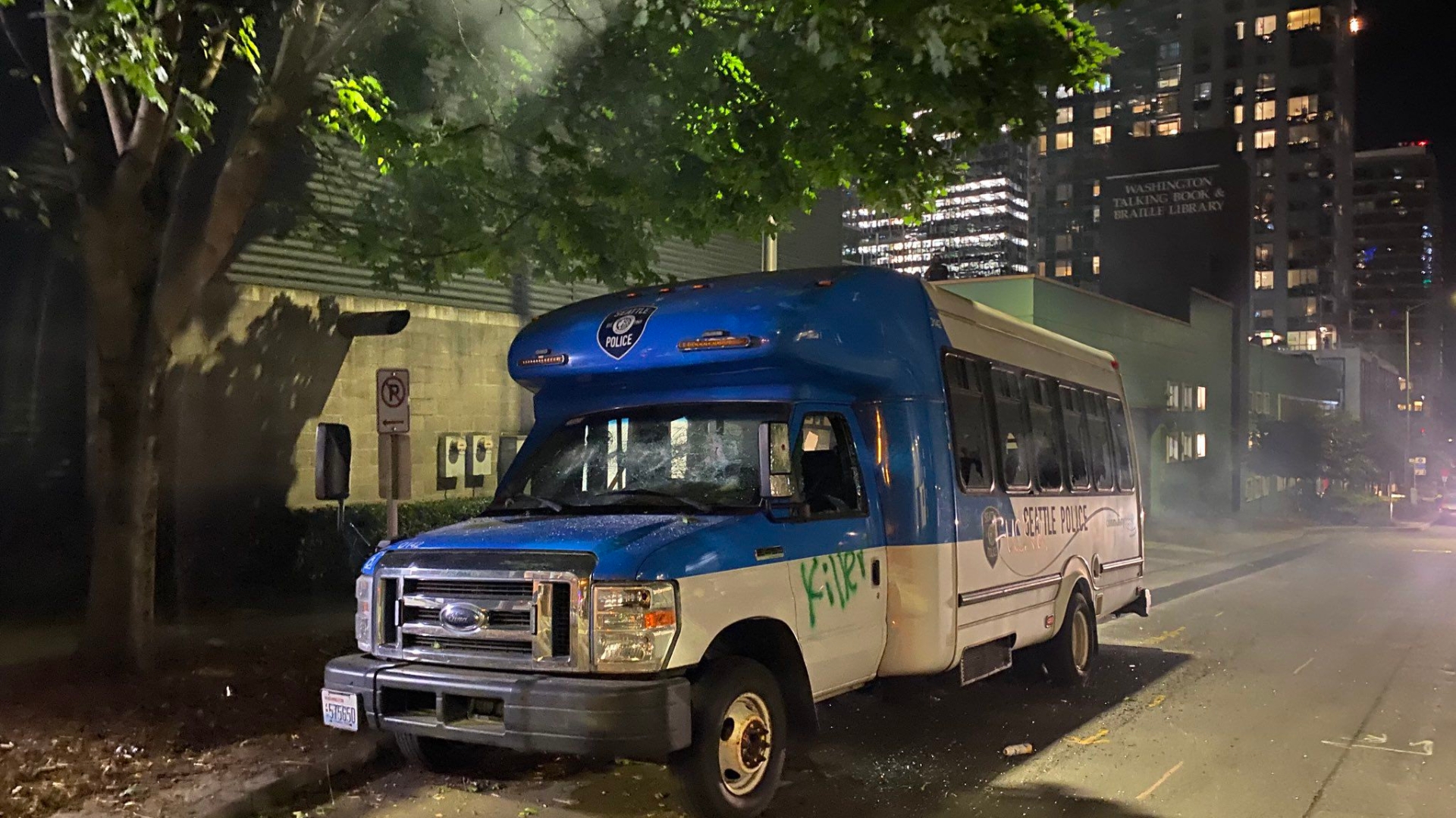 Police precincts vandalized; officer injured during Seattle protests ...