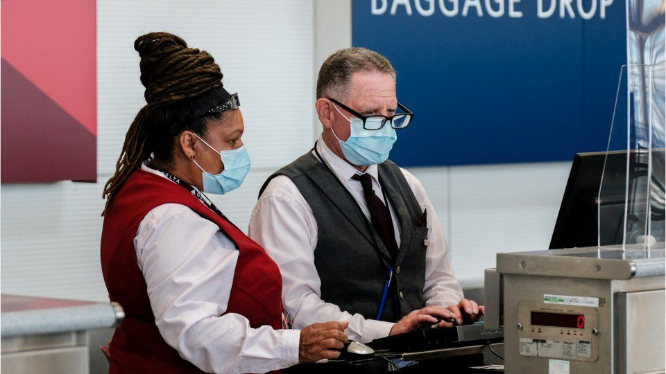 Coronavirus Unvaccinated Delta Air Lines employees to face 200 monthly health care surcharge
