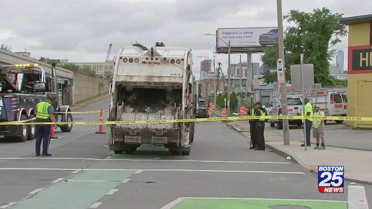 Woman seriously injured after garbage truck hits her while crossing