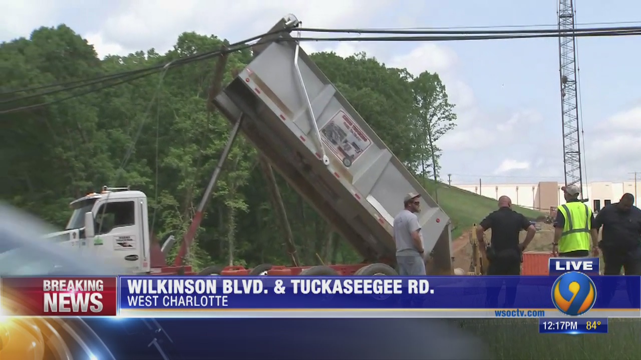 Stretch of Wilkinson Boulevard reopens after dump truck knocks down