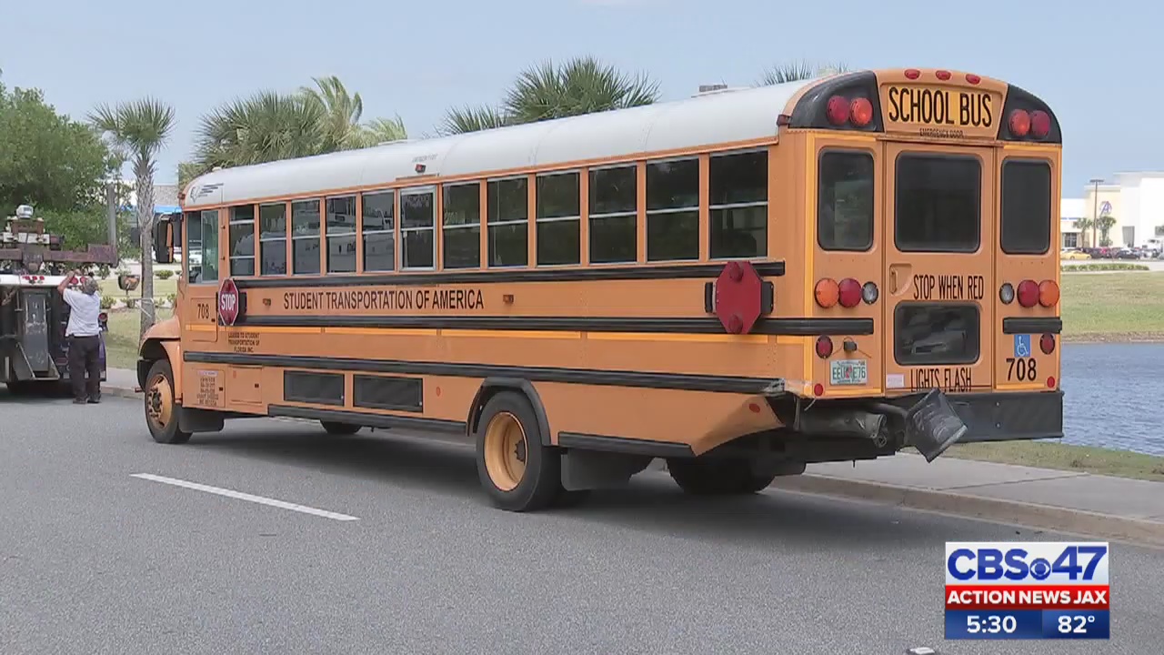 Fourvehicle crash, involving school bus, leaves woman dead in East