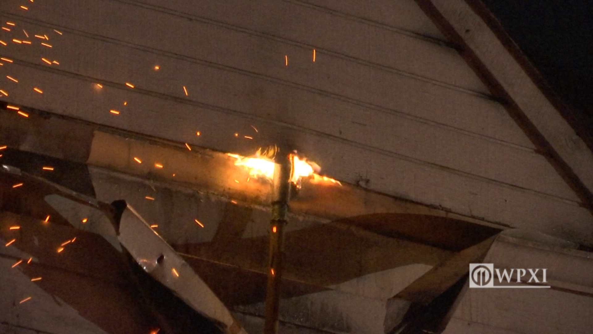 Fire spreads to 2 homes, displacing several people