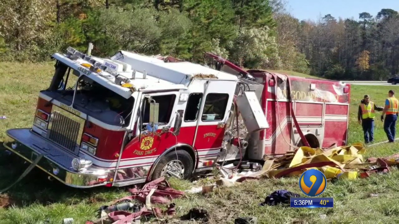 Fire truck rolls over in wreck on way to emergency