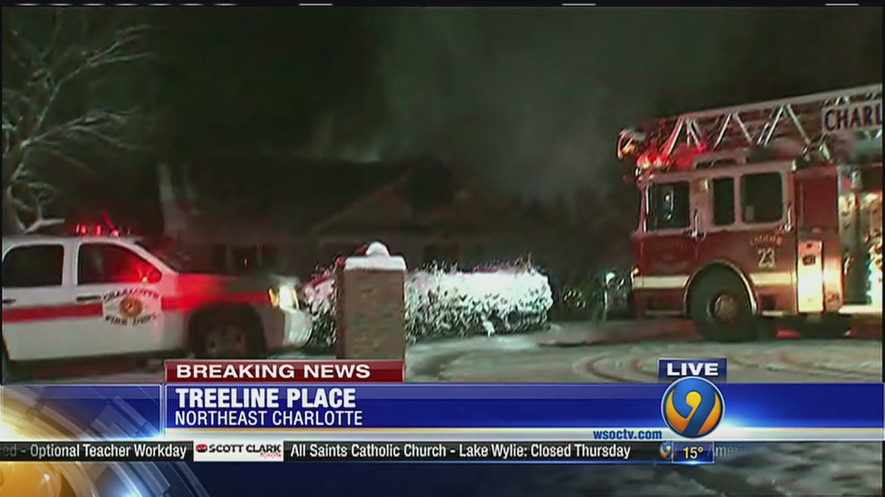Charlotte firefighters battle raging house fire in freezing conditions