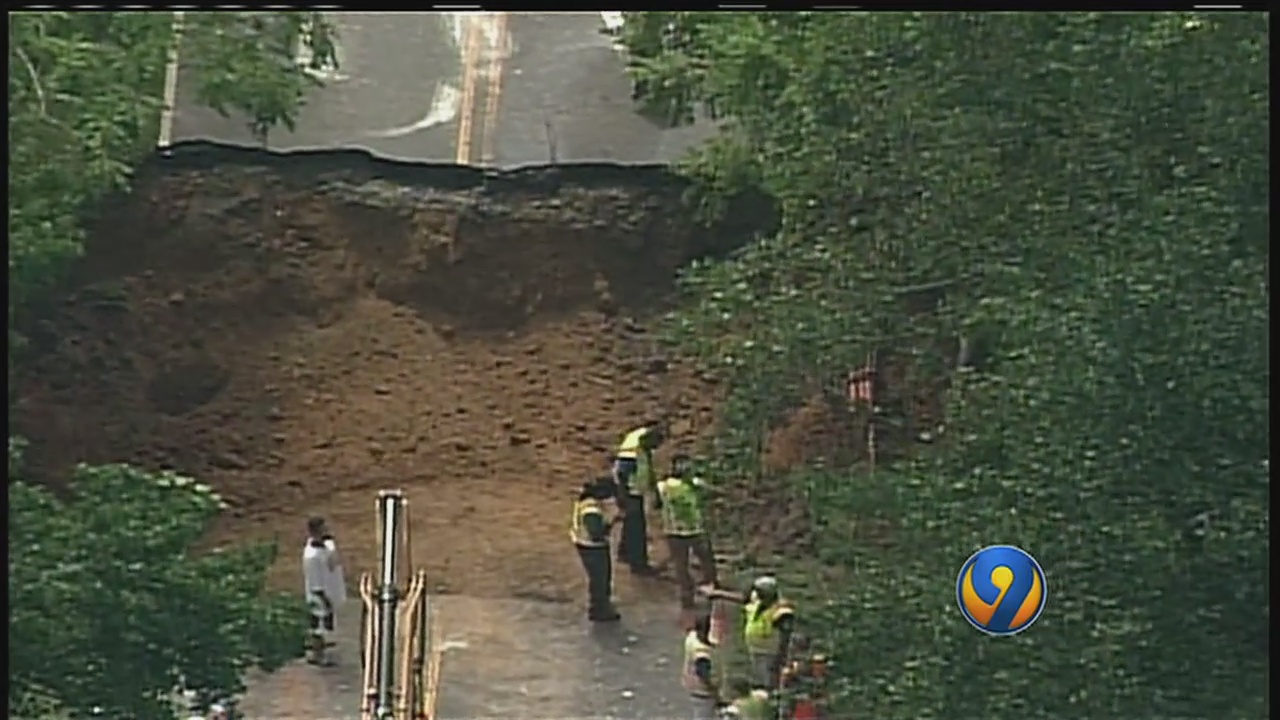 Flash flooding washes away 20foot section of Mallard Creek Road WSOC TV