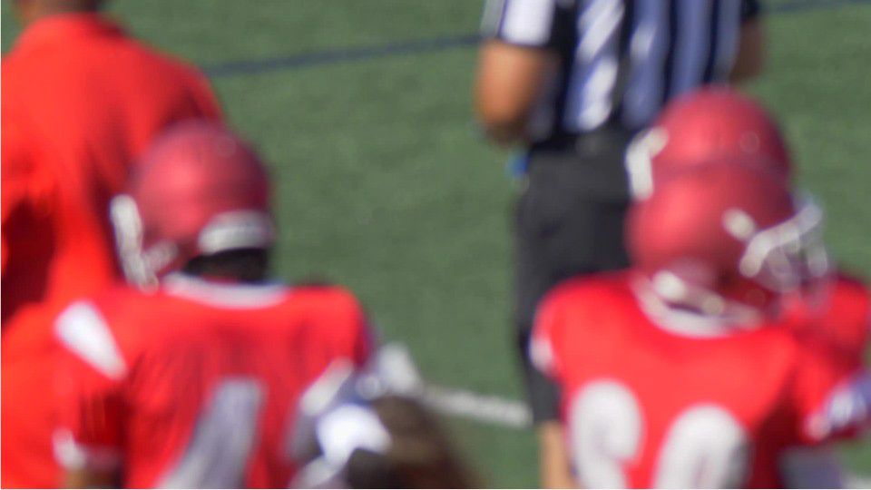 Youth football coach under investigation after viral video shows him